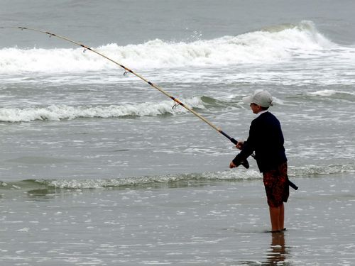 He had no bait.  His dad was teaching him how to cast - and how to be patient too.